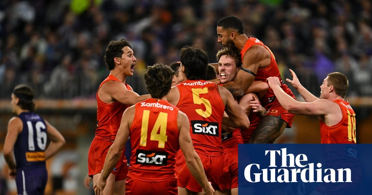 Gold Coast sink Fremantle in wild ending to claim club’s first AFL finals win