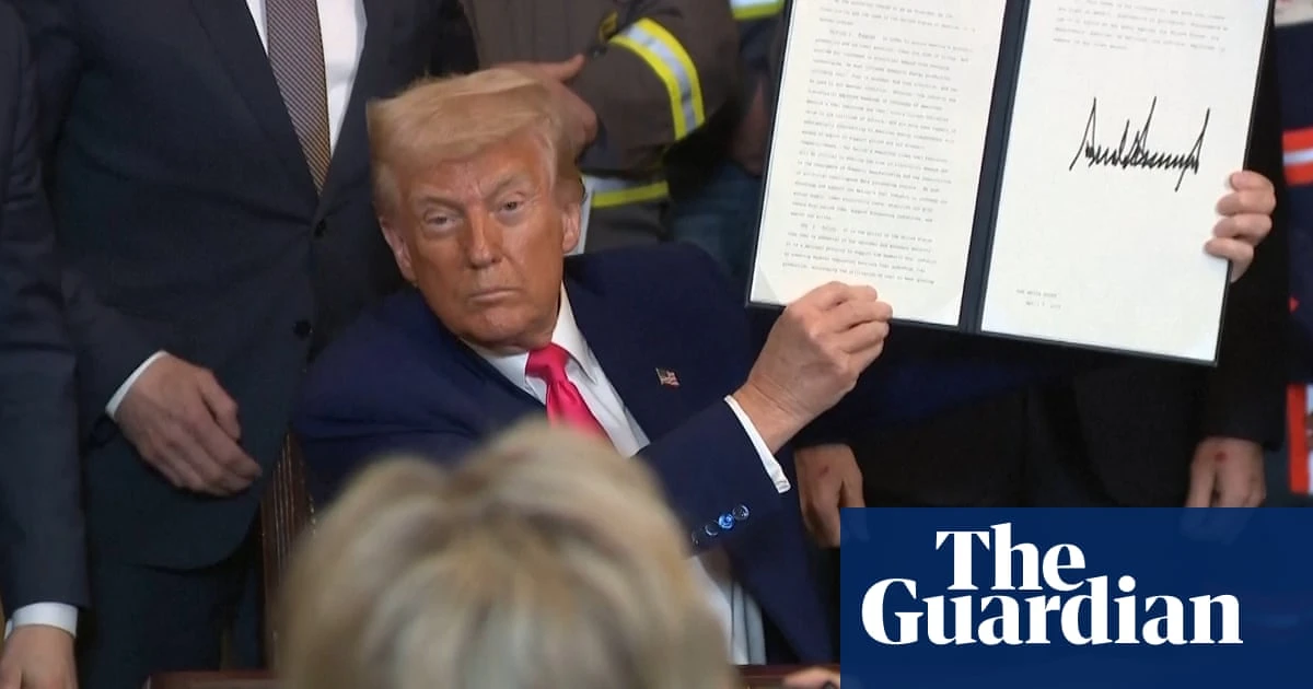Trump signs executive orders to boost 'beautiful, clean' coal  – video