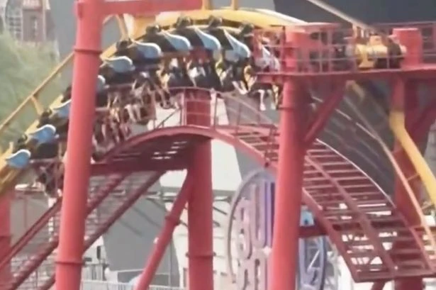 Horror as thrill-seekers left dangling on rollercoaster 100m in air as storm cuts power