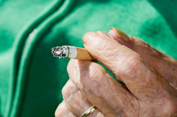 Old lady caught by firefighters throwing cigarettes at fire started by cigarette