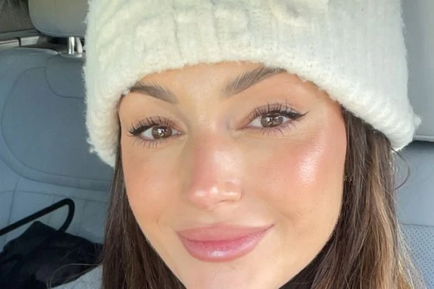 Michelle Keegan stuns in white sports bra as she works up a sweat playing padel