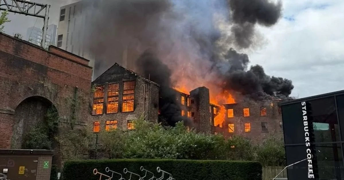 LiveManchester fire LIVE: Blaze breaks out by train station as smoke seen for miles