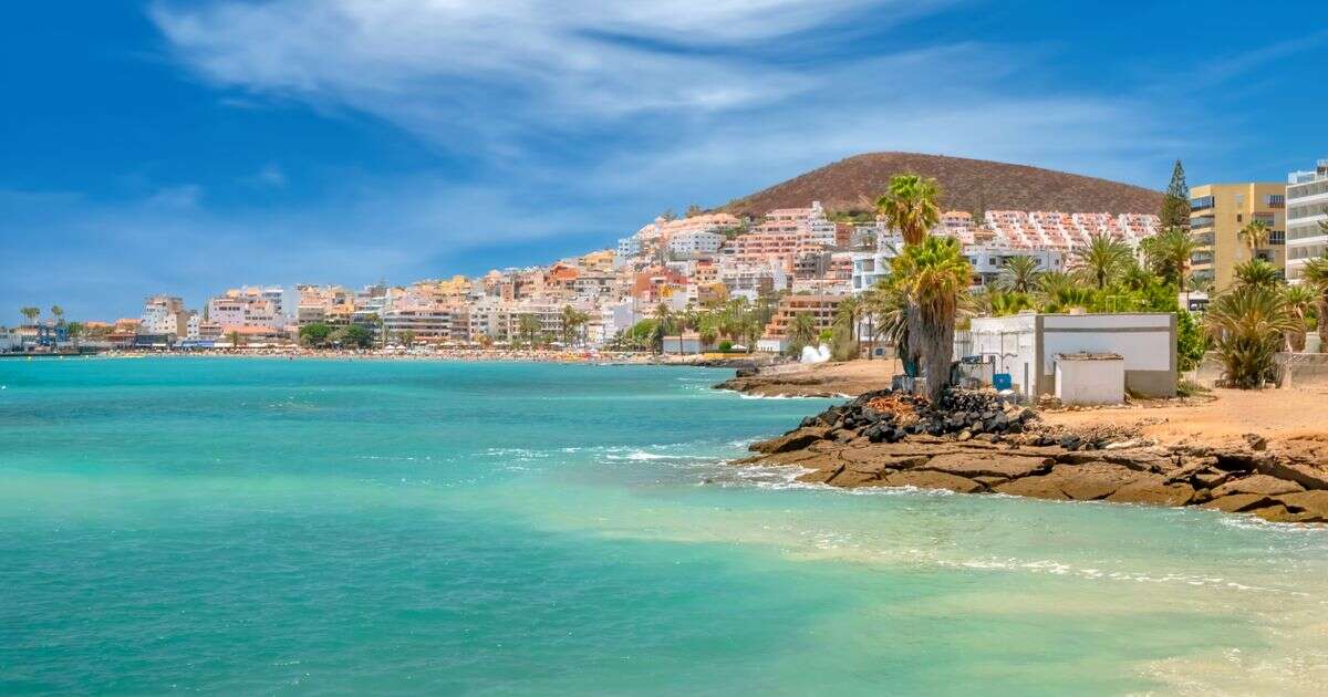 Couple caught 'romping' as children play on Tenerife tourist beach