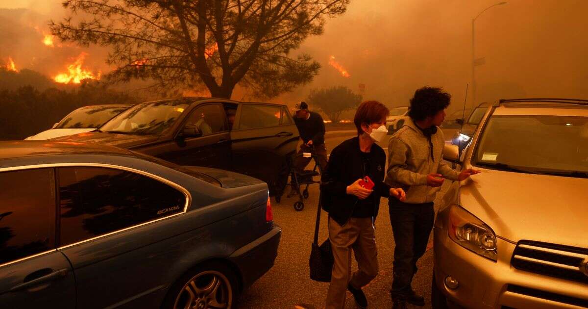 Horror Los Angeles wildfires tear through city as thousands fleeing for lives trapped in gridlock