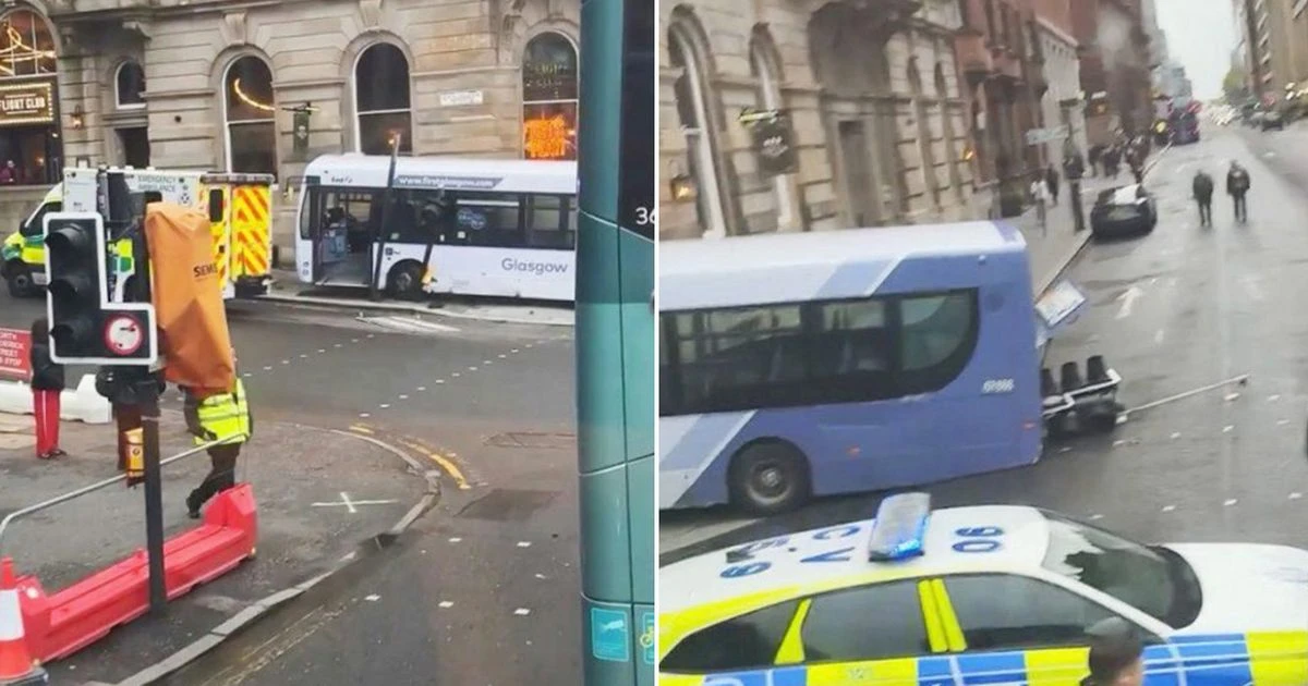 Driver rushed to hospital after bus smashes into building in busy city centre street