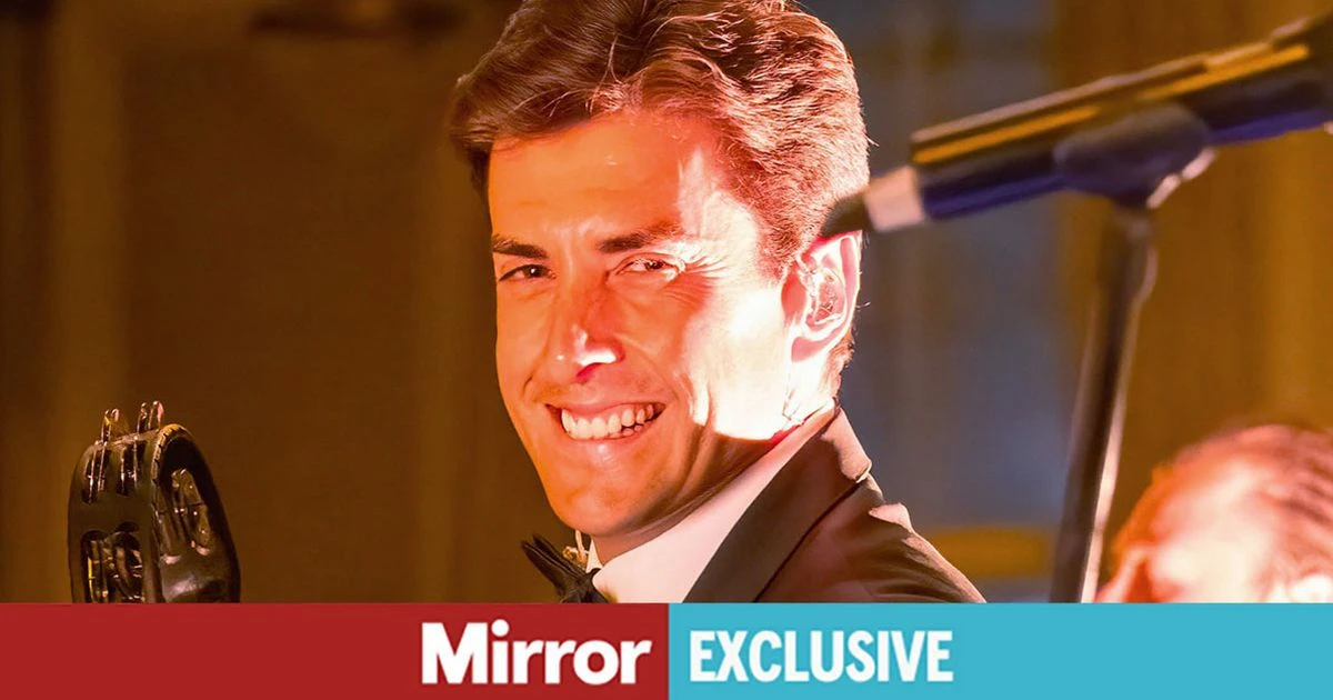 James Argent sings and poses with fans on return to stage days after assault arrest