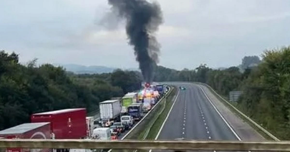 LiveM5 LIVE: Huge traffic queues with truck 'fully on fire' as motorway closed