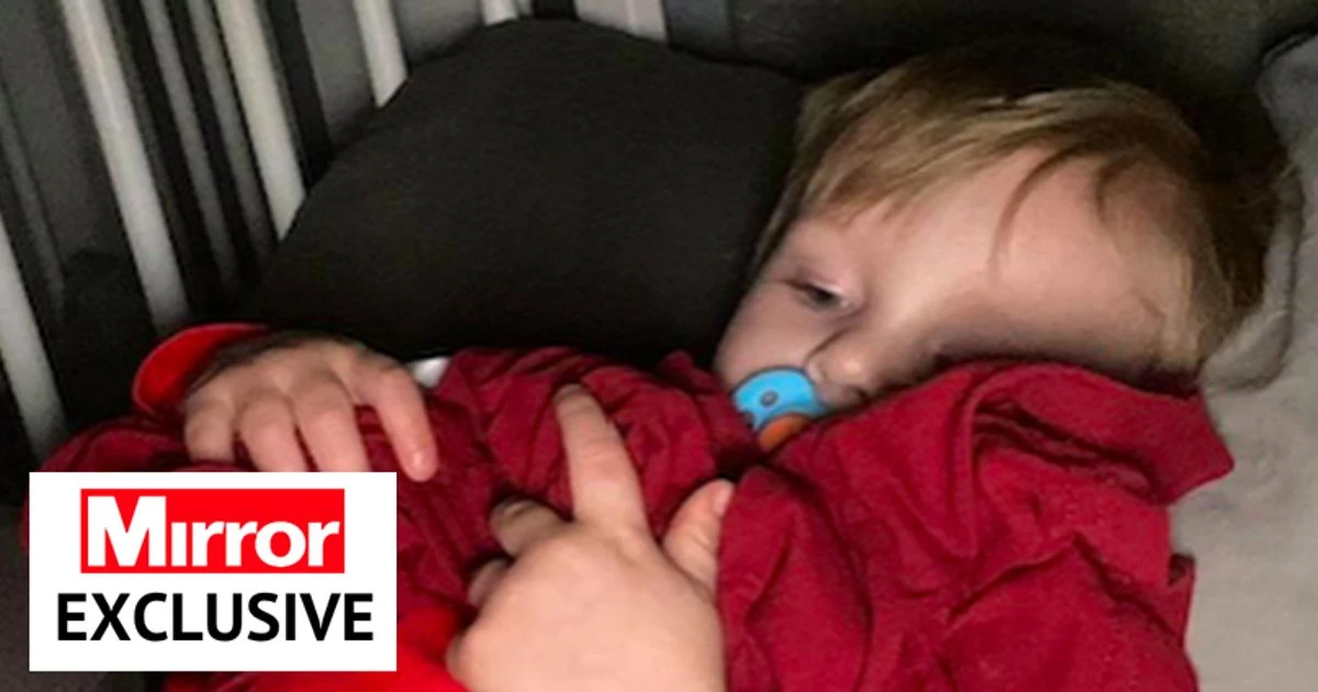 Boy, 2, hugs dad's T-shirt every night waiting for him to be freed from prison