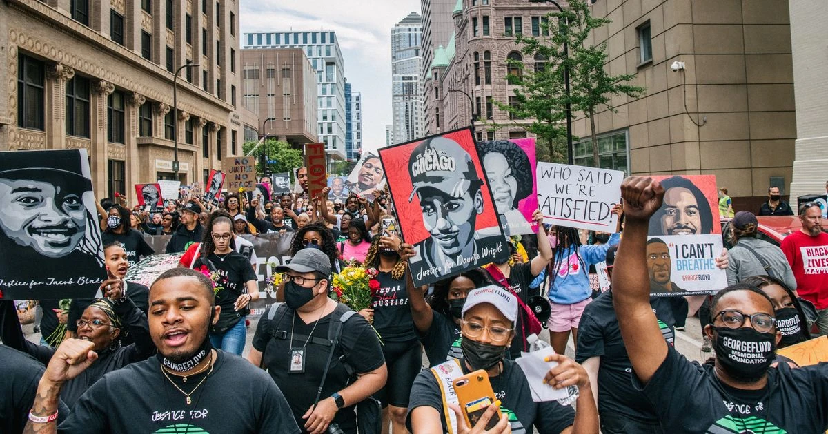 George Floyd's family march alongside hundreds to mark 'painful' year since his death