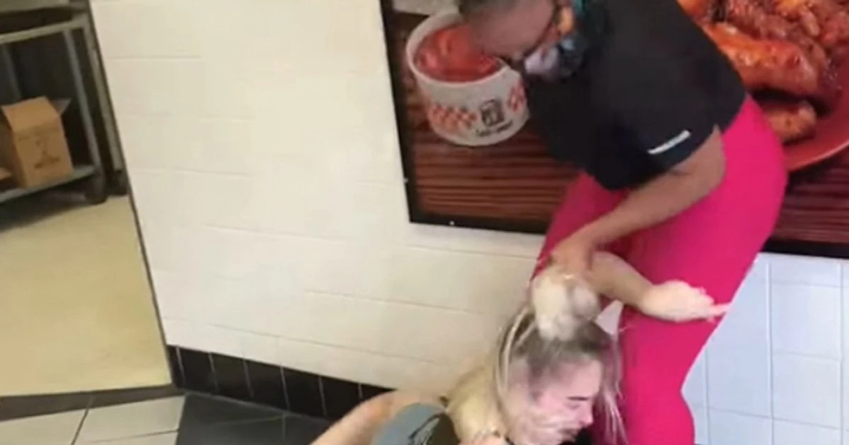 Woman stamps on mum’s head in vicious pizza shop attack as baby daughter clings on