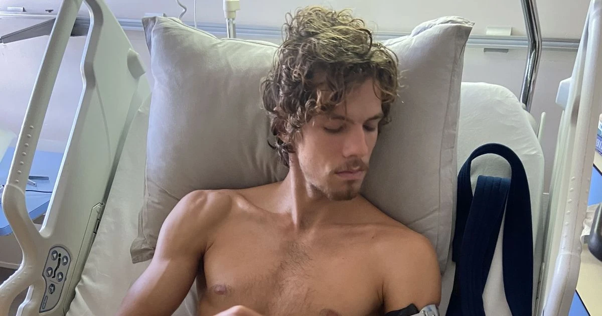 Horror photos of diver's arm minced by shark that he fought off with penknife
