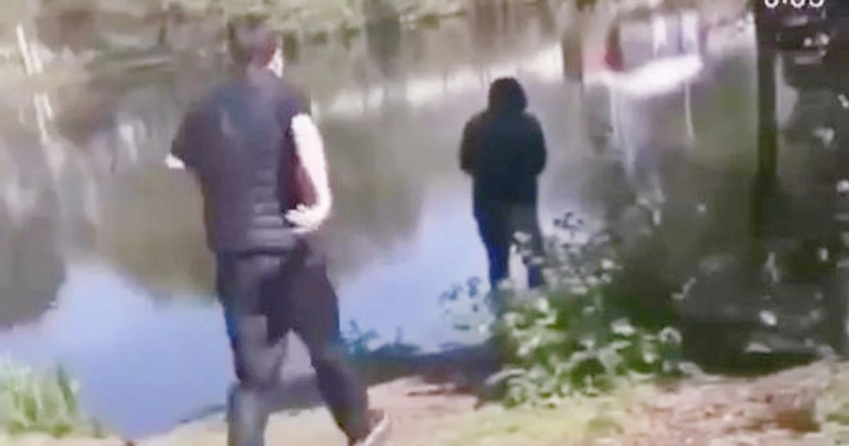 Gang films thug 'fly kicking' pensioner, 74, into dirty river in sickening attack