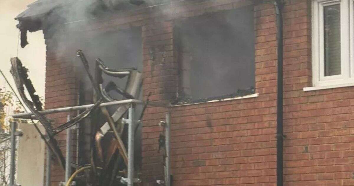 Catford house fire sparks huge inferno as woman scrambles to roof to escape blaze