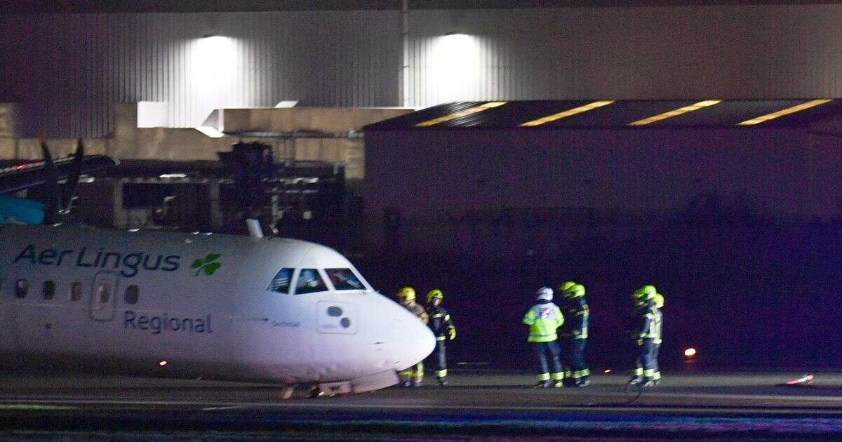 BREAKING: Belfast airport: Plane crash lands as landing gear collapses whilst 82mph winds batter UK