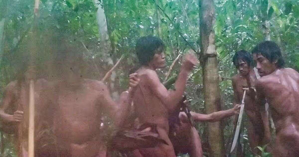 Incredible images of forgotten Amazon rainforest tribe who discourage outsiders with foot spikes