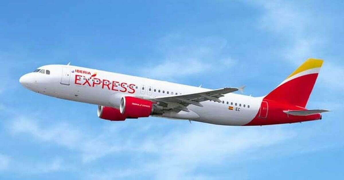 Fuming Iberia plane passenger releases emergency slide after flight was delayed by half an hour