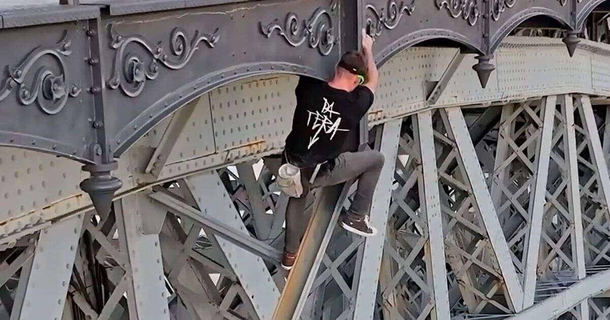 Daredevil free-climber's death-defying stunt so quick cops didn't even see him