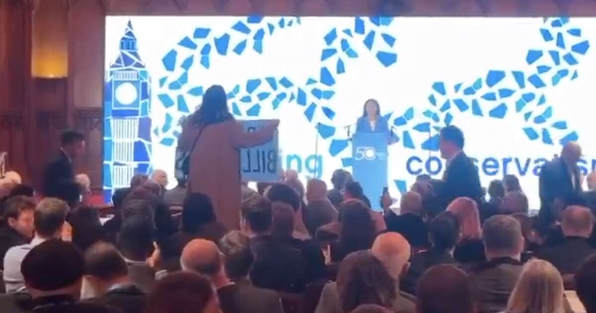 Kemi Badenoch humiliated as major speech is interrupted by TWO hecklers dragged out by security