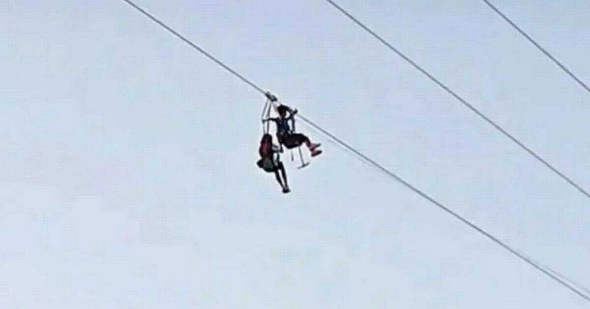 Terrified tourists stuck mid-air on mountain zipline told they're to blame for being 'too light'