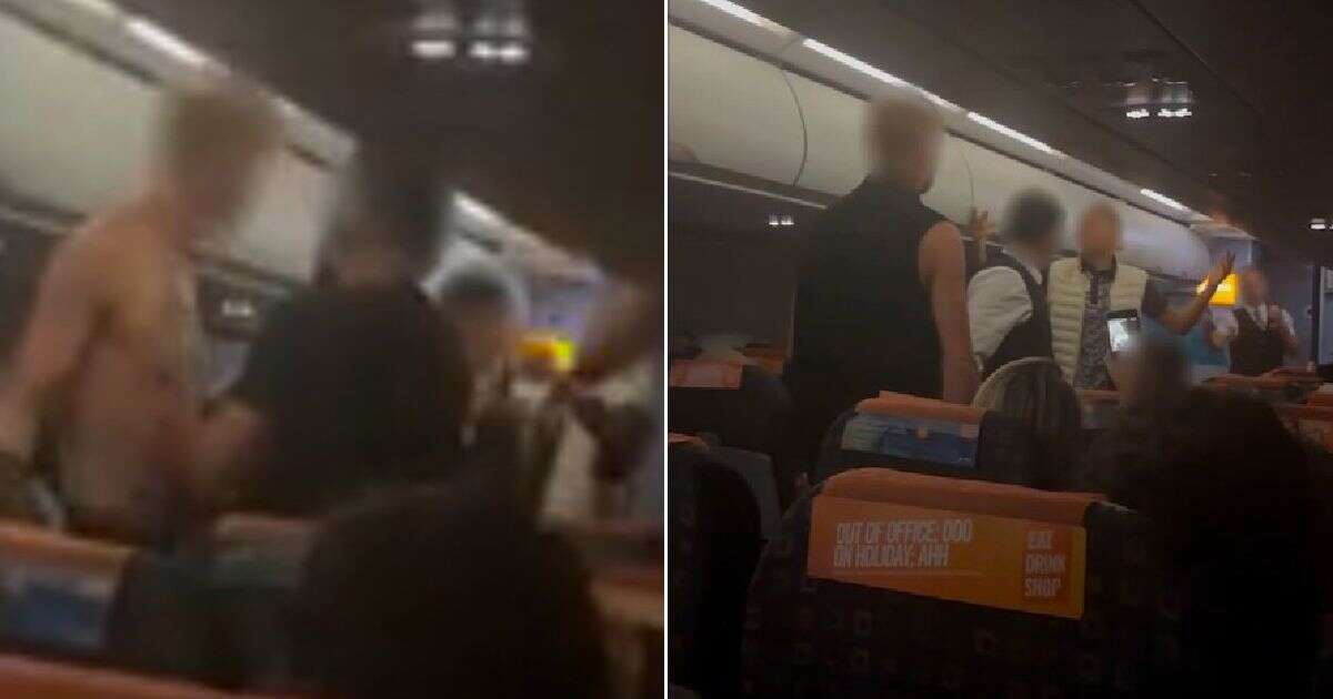 Moment brawling easyJet passenger rips shirt off as captain begs him to stop