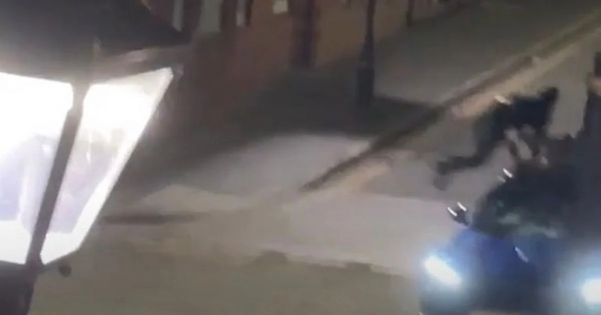 Shocking moment man attacks woman and then leaps on moving car