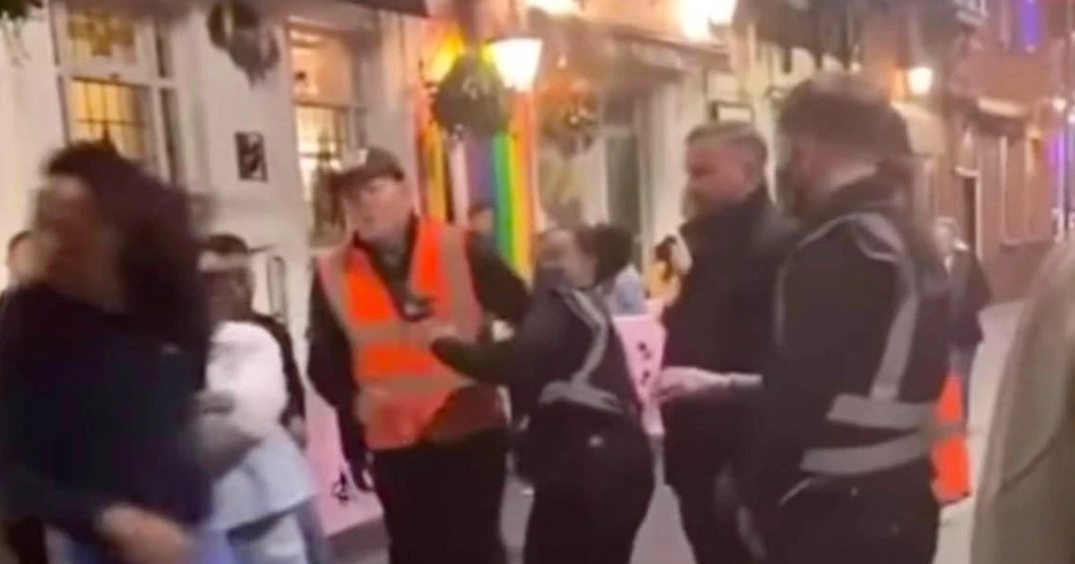 Rowdy man slaps female bouncer and scales taxi in wild city centre rampage