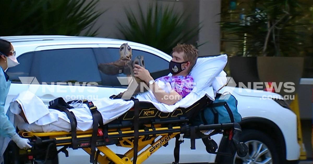 Man in hospital after hotel balcony plunge while 'trying to escape quarantine'