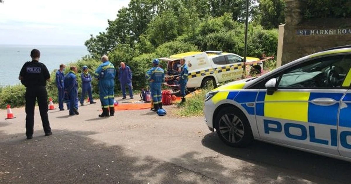 Woman escapes car crash over 100ft cliffs - only to fall another 50ft onto beach