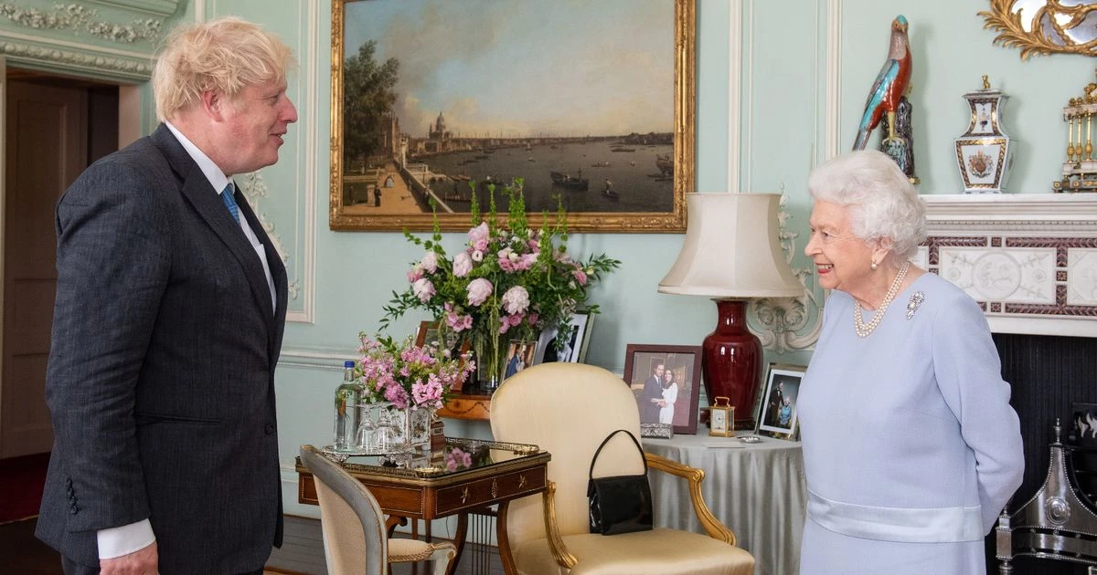 Queen leaves photo of Meghan Markle off family portrait table at latest engagement