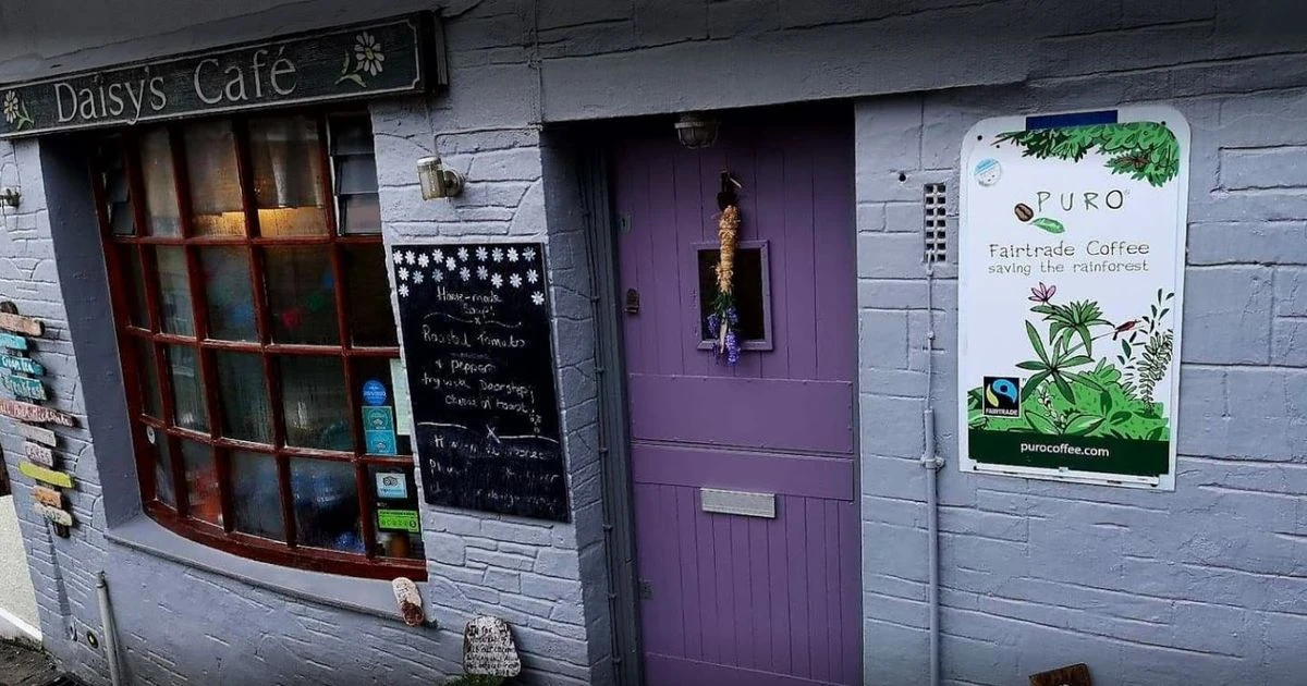 Cafe owner with golliwog doll on show says 'I'm not racist I'm from Leicester'