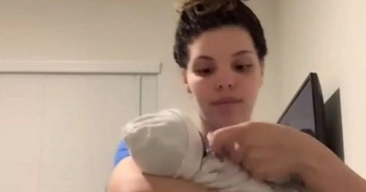 Mum demonstrates how to hold a baby to stop them crying instantly