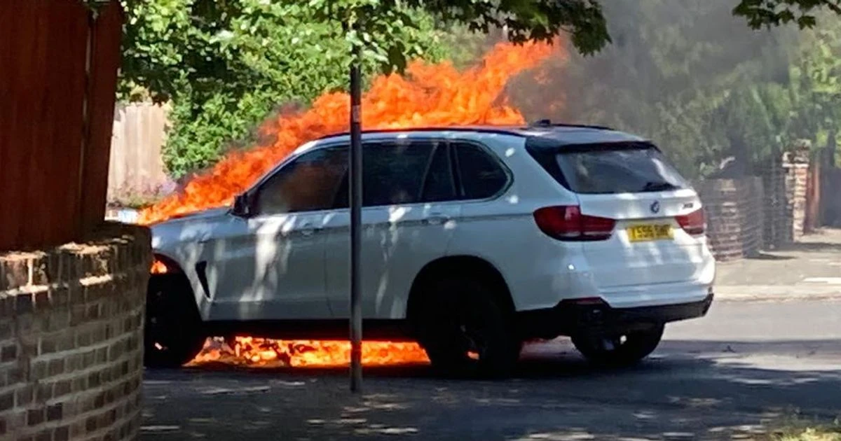 Hero dad pulls his son, 4, from burning car 'seconds' before it explodes in fireball