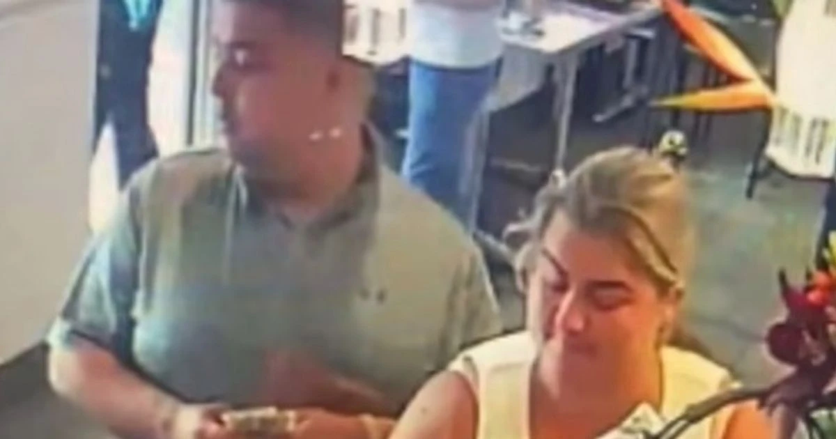 Couple who yelled at police for saving dogs in hot car filmed 'stealing from cafe'