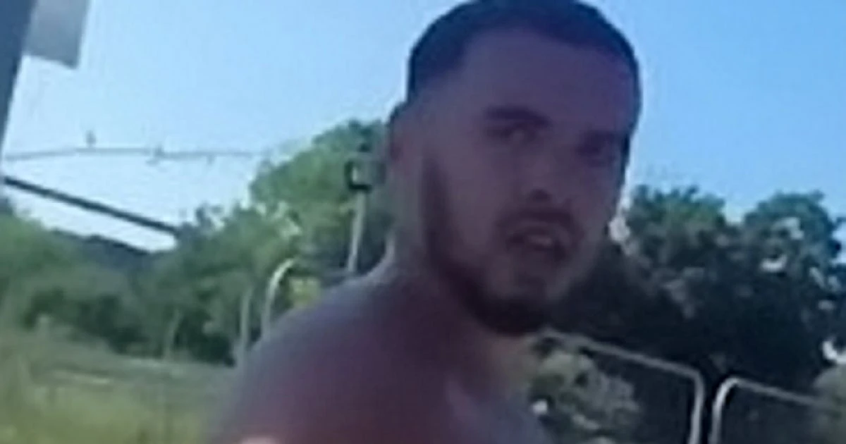 Police hunt for 15 men after deckchairs and tables thrown in mass brawl on beach