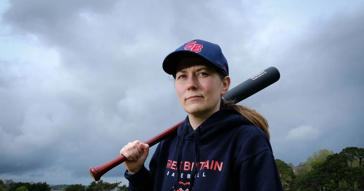 Women's GB baseball manager quits sport over sexist tweet showing topless woman