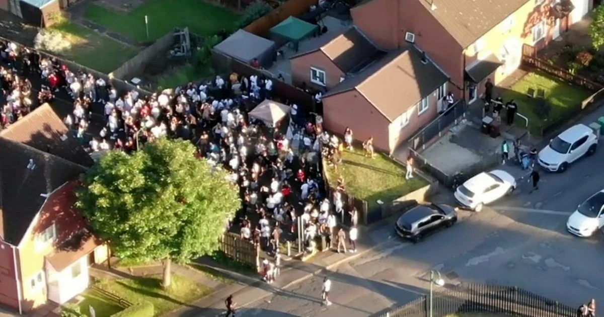 Drone captures 300-strong street party which descended into violence with teen stabbed
