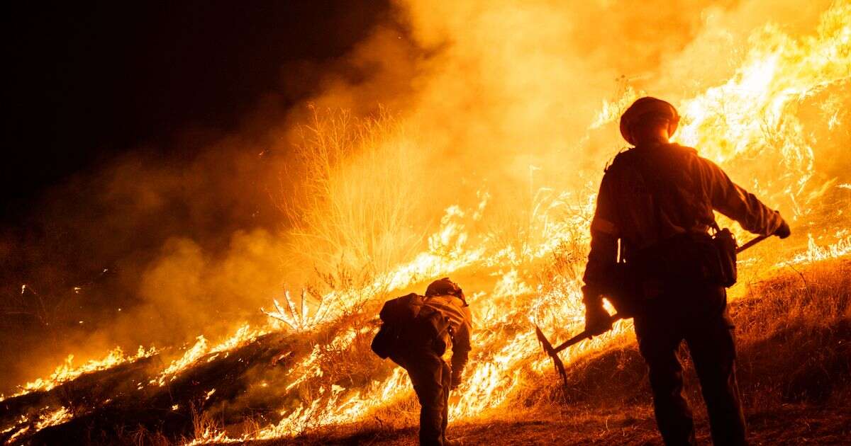 Some 50,000 evacuated after yet another LA fire tears through mountains in California