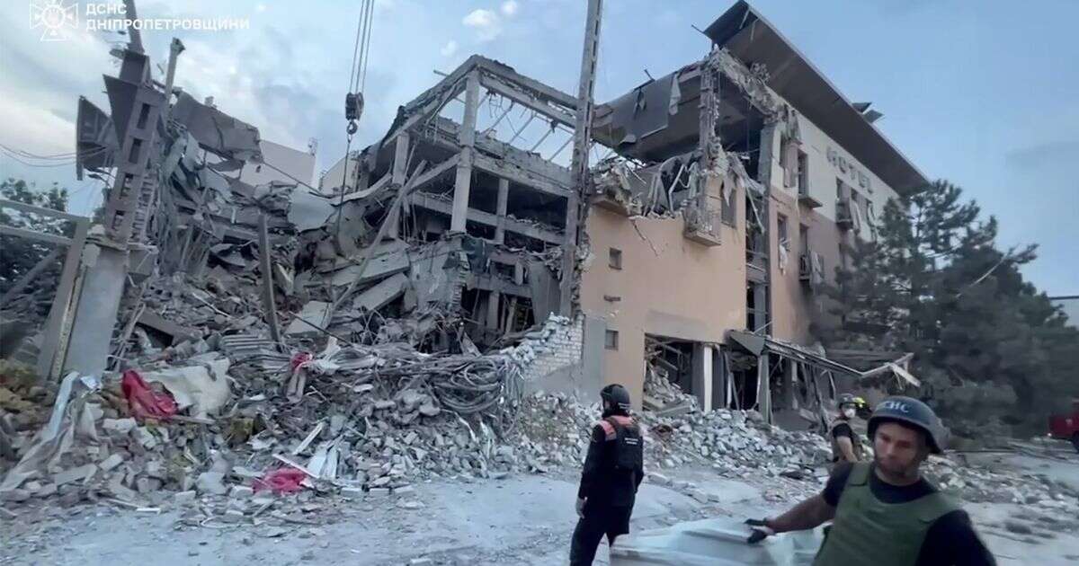 Two killed after Russian strike 'wipes out' Ukraine hotel with fears survivors trapped