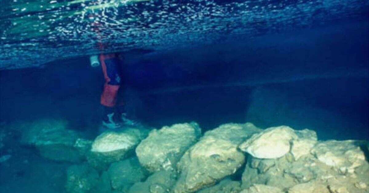 6,000-year-old bridge built by ancient humans is discovered in secret underwater cave