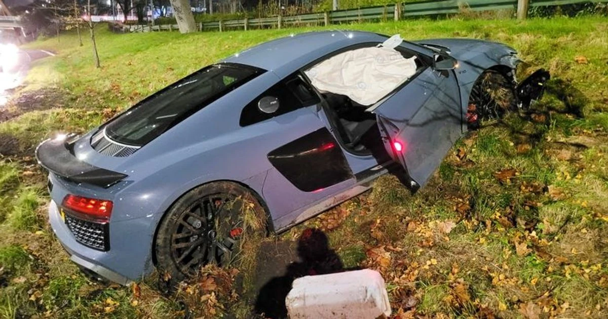 Pictures show £110,000 Audi supercar wreckage after crashing into grass embankment