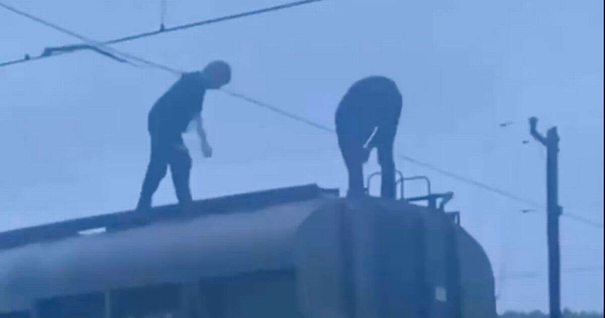 Horror moment teen suffers electric shock after climbing on top of Russian train