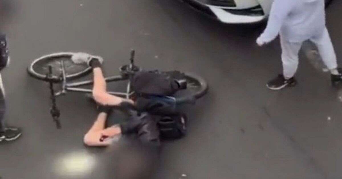 Shocking road rage moment cyclist is hurled to ground by driver in busy city centre