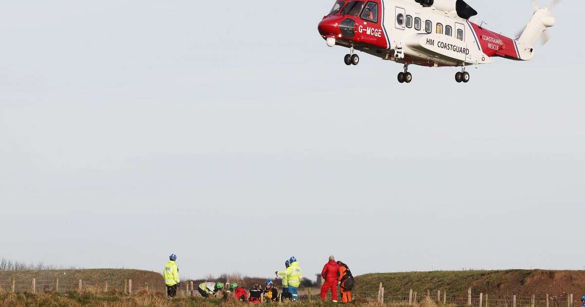 Major rescue operation launched after man drops down 20ft cliff face as three arrestedCrime