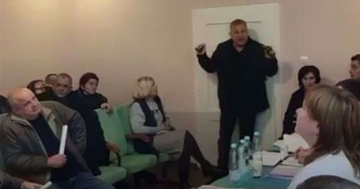 Terrifying moment rogue Ukrainian politician casually tosses grenade into council meeting