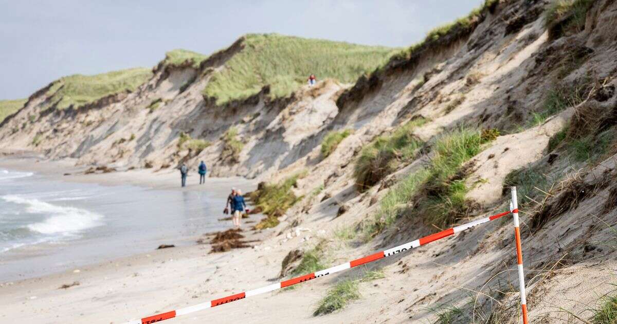 Two boys, 9 and 12, killed in horror beach accident as hole they were digging in sand collapsed