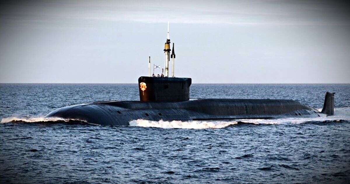 Vladimir Putin's nuclear submarines sail under Polar icecaps in stark warning to West