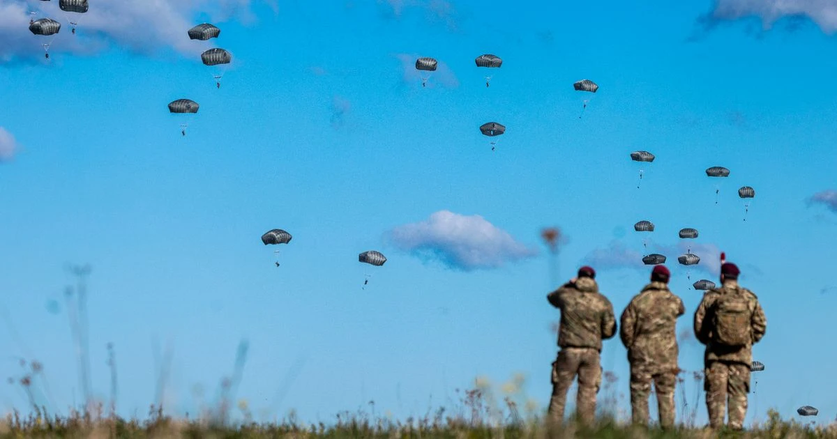 UK paratroopers swoop from sky in Russia's back yard in defiant NATO exercise despite Putin's posturingVladimir Putin