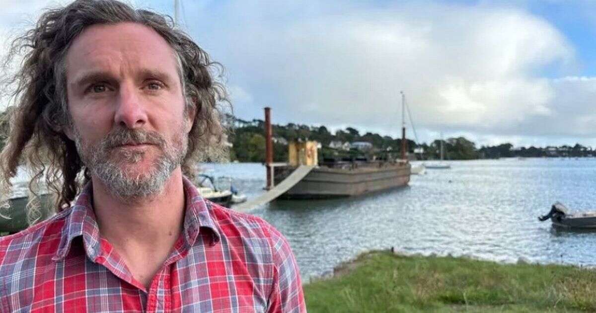 Dad facing two years in prison for mooring boat on his own land