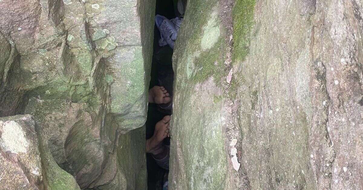 Woman trapped upside down between boulders in seven-hour phone search nightmare