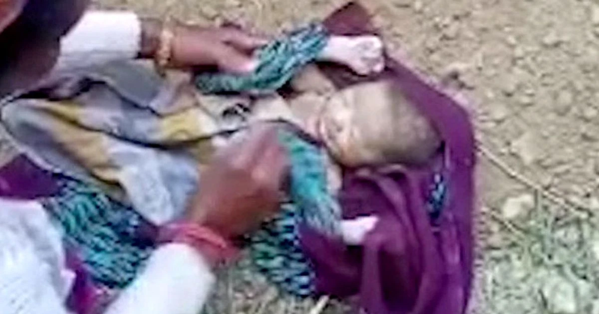 Newborn baby rescued by shocked locals after being buried alive in field in India